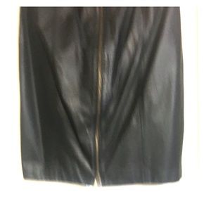 100% Black leather skirt, zips up the front